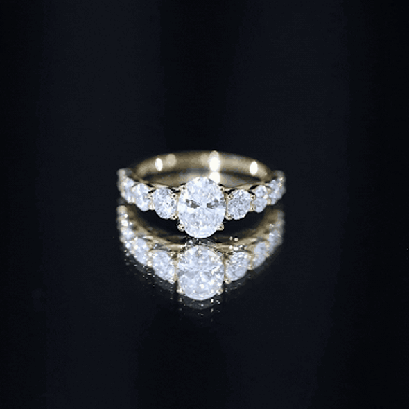 Lab Grown Diamond 6X8 MM Oval Engagement Ring With Side Stones