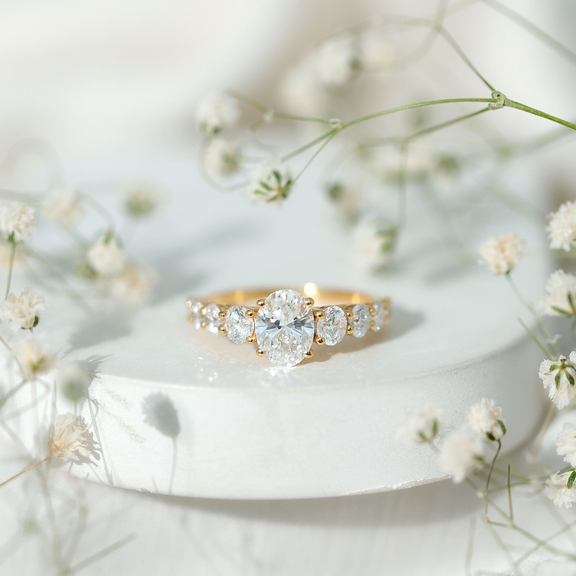 Lab Grown Diamond 6X8 MM Oval Engagement Ring With Side Stones